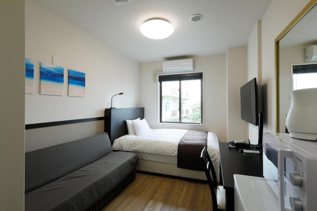 Phoenix Park Hotel Nago Exterior photo